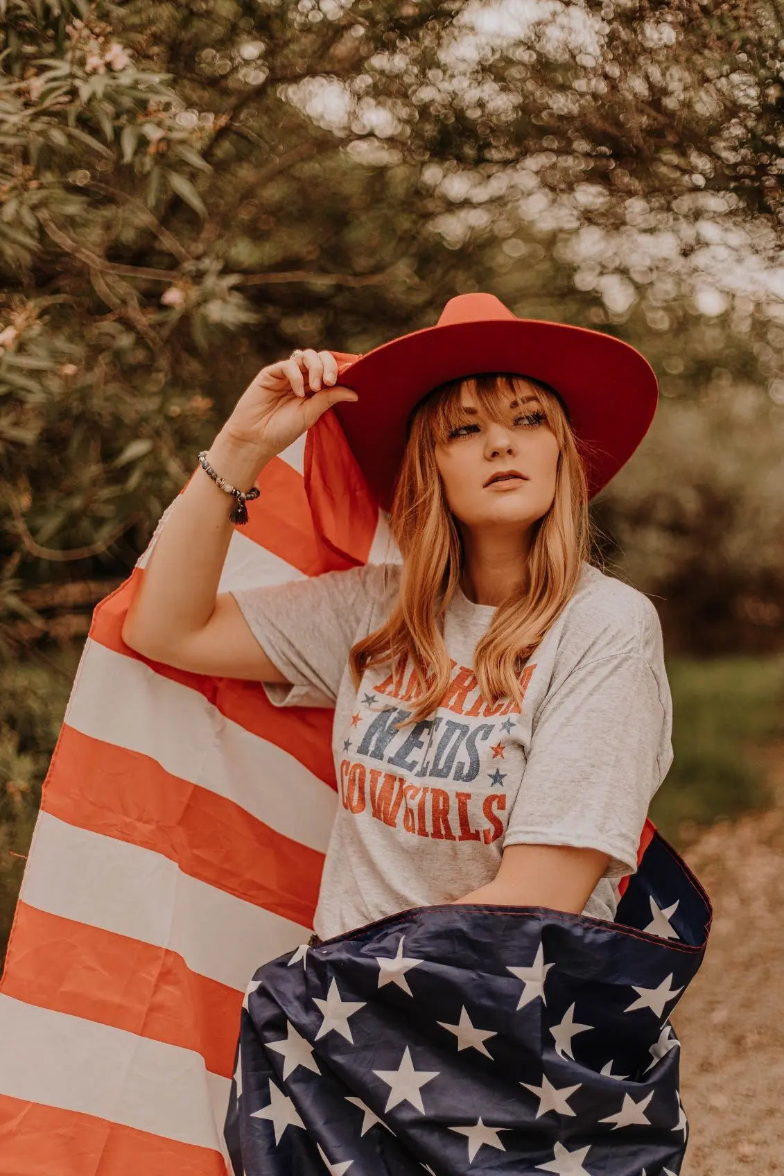 America Needs Cowgirls Graphic Tee Wild Junkie