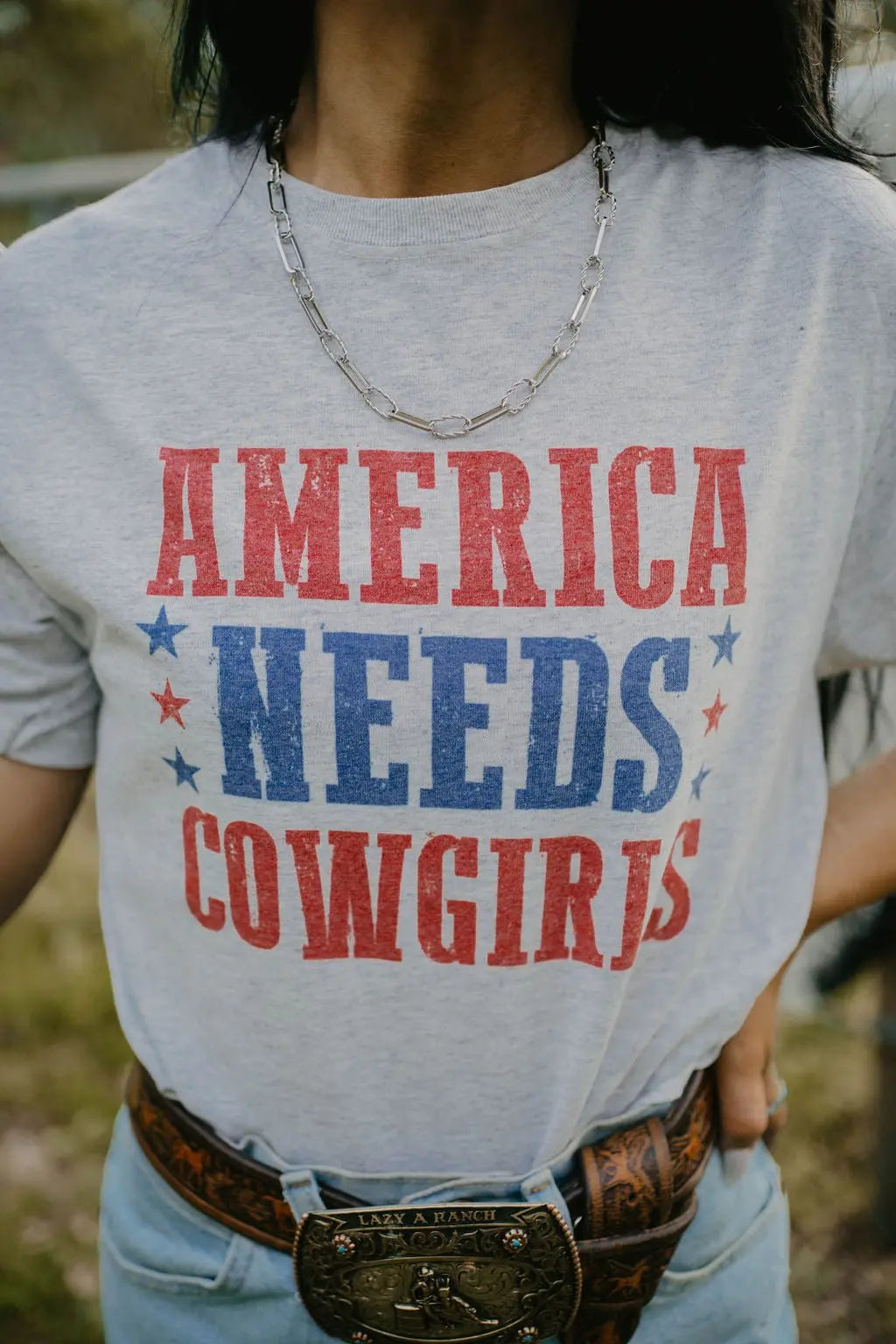America Needs Cowgirls Graphic Tee Wild Junkie
